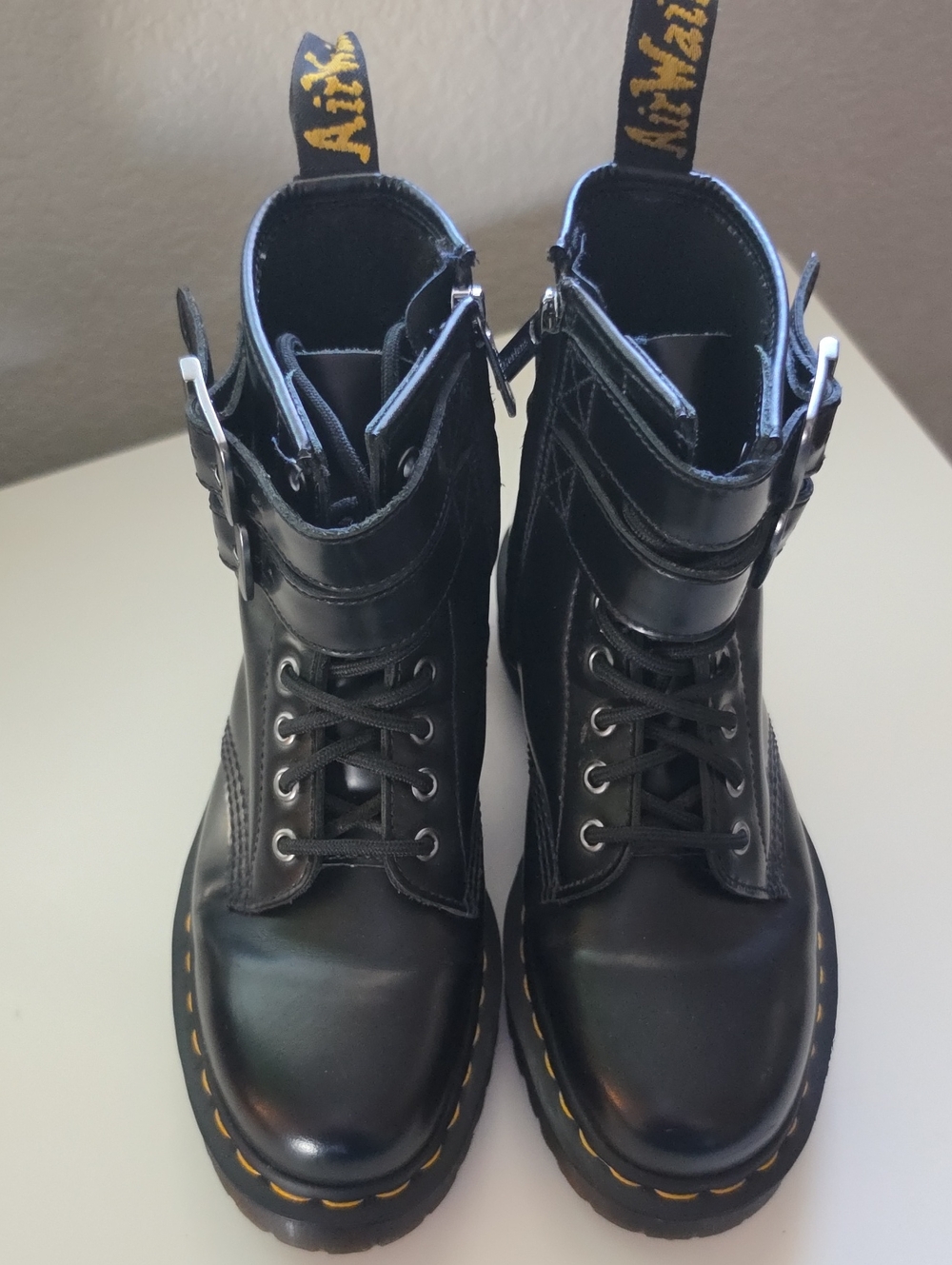 Dr. Martens Black Leather Combat Boots with Yellow Stitching